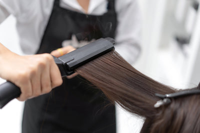 How To Minimize Damage When Using A Flat Iron